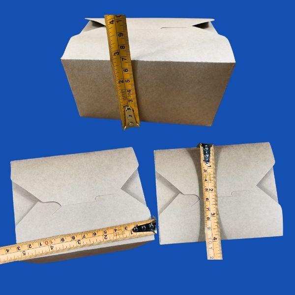 Close-up overhead shot of a single natural brown Kraft paper takeout container in its flat, open state, showing the pre-scored folding lines and lock mechanisms against a white background