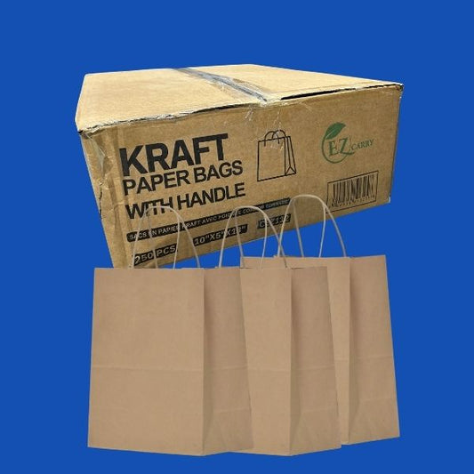 Three natural brown Kraft paper takeout bags with sturdy twisted handles shown standing upright, in front of a bulk corrugated shipping case against a solid blue background.