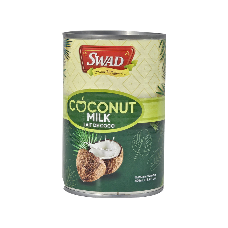 Can of Swad Coconut Milk made from fresh coconut extract, featuring traditional packaging ideal for Indian, Thai, and tropical cooking recipes.
