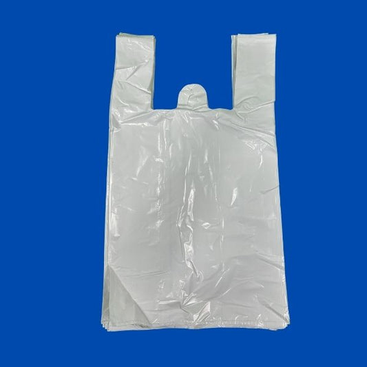 A single, large, crumpled white plastic t-shirt style shopping bag, shown from the front with handles extended, isolated against a blue background
