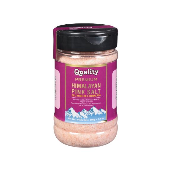 Close-up of Himalayan pink salt nutrition and weight information on a 1.1 pound jar.
Professional grade Himalayan pink salt shaker bottle with a bilingual English and French label.