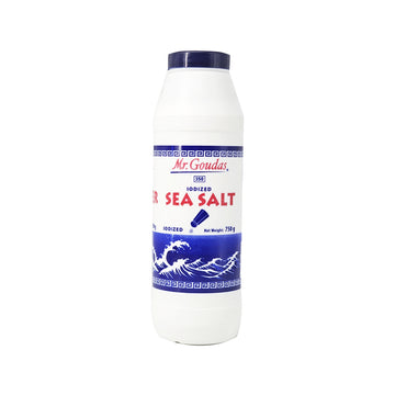 A 750g white shaker bottle of Mr. Goudas Iodized Sea Salt with blue wave graphics.