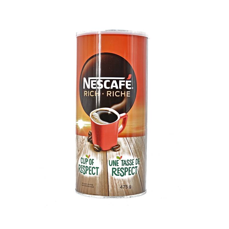 Front view of Nescafe Rich 475g glass jar featuring bold roast and smooth taste labels.