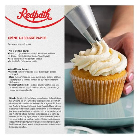Close up of professional buttercream frosting being piped onto a cupcake using pure cane sugar