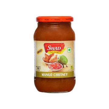 A 500g jar of Swad Sweet Mango Chutney featuring a green mango and samosas on the label.